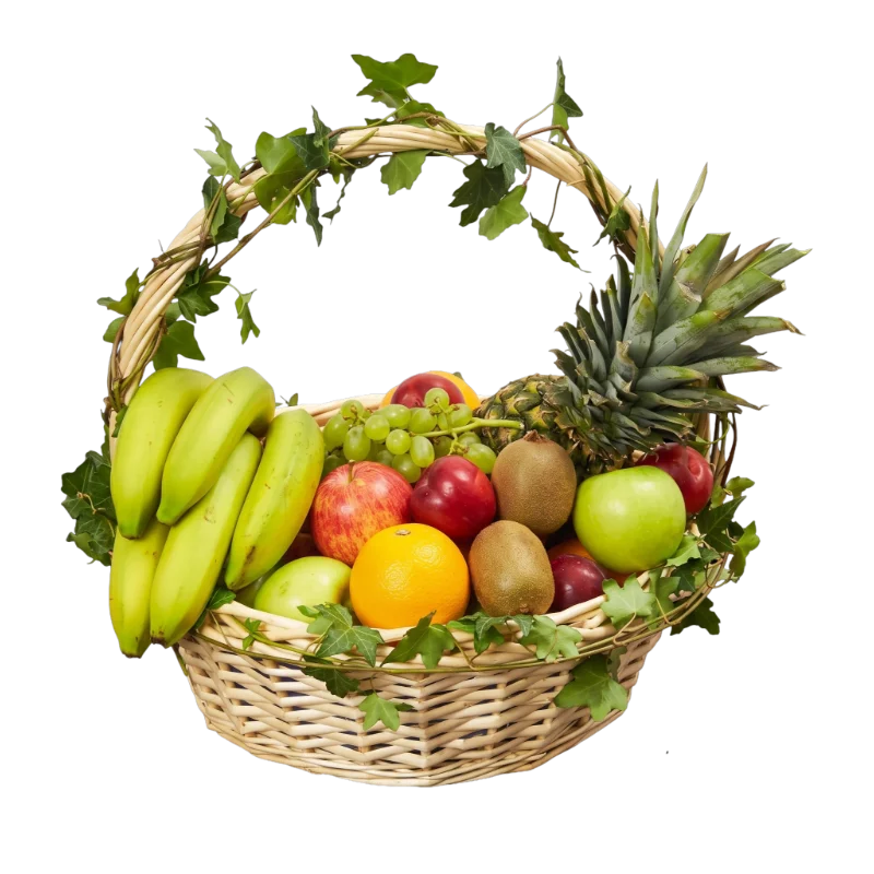 The Evergreen Orchard Fruit Basket featuring premium seasonal fruit including pineapple, bananas, apples, kiwi fruit, grapes and oranges presented in a wicker basket decorated with ivy vines by Gifts & Co.