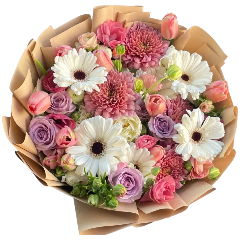 Luxury Garden Pastel Bouquet featuring premium white gerberas, lavender roses, chrysanthemums, tulips, lisianthus and seasonal flowers wrapped in elegant kraft floral wrapping by Gifts & Co.