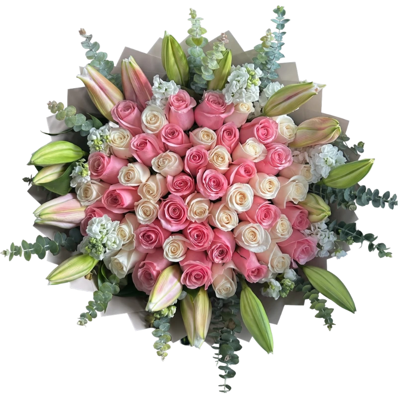 Luxury Pink Rose & Lily Bouquet handcrafted with blush pink roses, ivory roses, oriental lilies, white stock flowers and eucalyptus wrapped in premium floral wrapping by Gifts & Co.