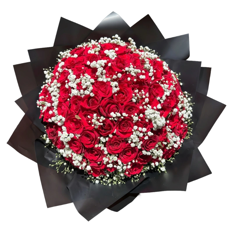 Scarlet Crown Bouquet handcrafted with premium long-stem red roses, delicate baby's breath, and luxurious black designer wrapping by Gifts & Co.