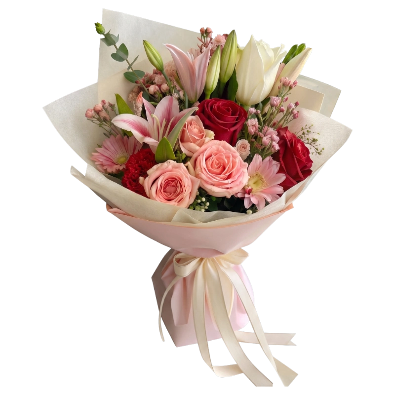 Premium Pink & White Mixed Flower Bouquet handcrafted with roses, lilies, carnations, chrysanthemums and seasonal flowers wrapped in blush and ivory premium wrapping by Gifts & Co.
