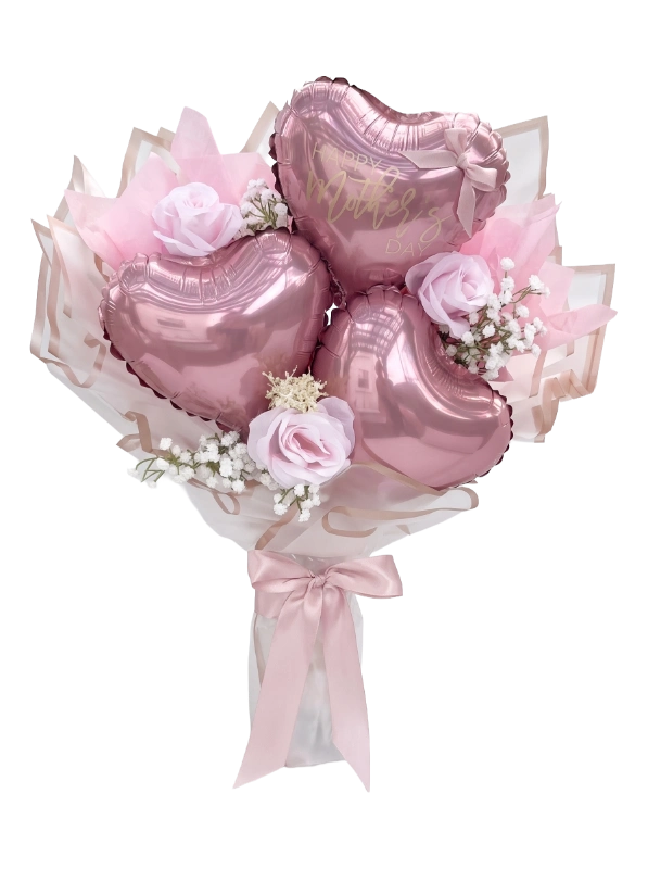 Blushing Hearts personalised balloon bouquet with metallic blush pink heart balloons, delicate roses, baby's breath and luxury pink wrapping by Gifts & Co.